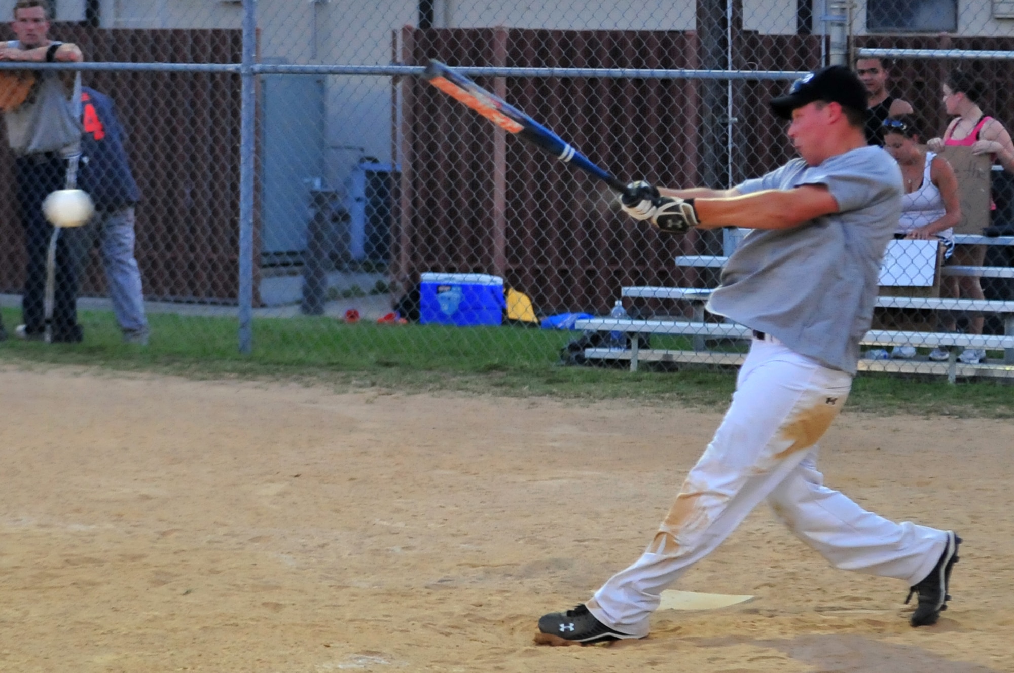 SEYMOUR JOHNSON AIR FORCE BASE, N.C. -- David Dunham hits a line drive during the Eagles Grand Slam Jamboree Softball Tournament championship game June 21, 2010. The 4th Logistics Readiness Squadron and the 4th Equipment Maintenance Squadron's ammunition flight competed for the championship game. Dunham is a member of the 4th LRS team who hails from Homer, N.Y. (U.S. Air Force photo/Senior Airman Rae Perry)