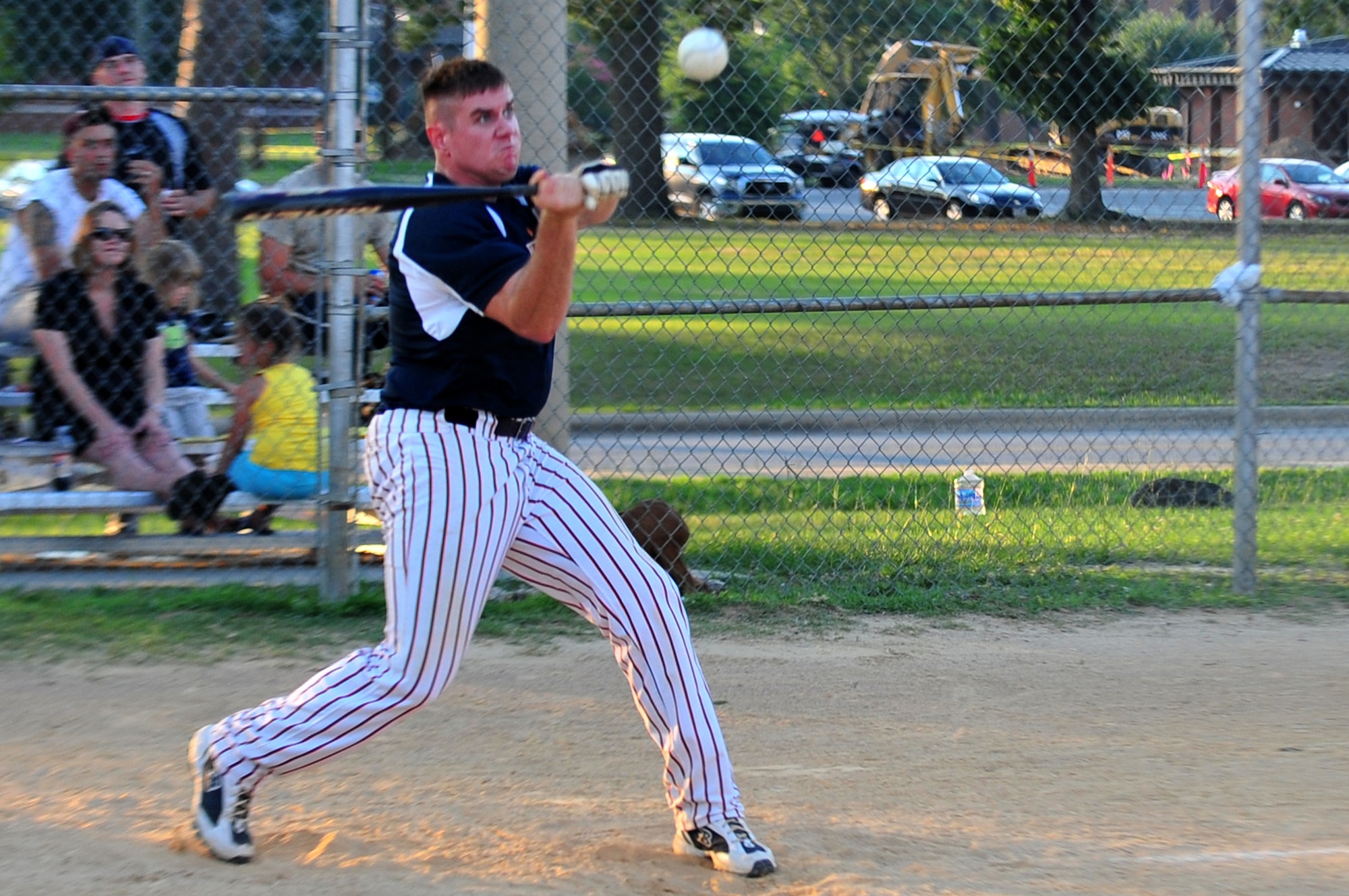 SEYMOUR JOHNSON AIR FORCE BASE, N.C. -- James Harrod keeps his eye on the ball as he swings during a semi-final game in the Eagles Grand Slam Jamboree Softball Tournament here June 21, 2010.  The 4th Equipment Maintenance Squadron's Ammunition Flight has won the tournament for the past four years. Harrod is assigned to the 4th Equipment Maintenance Squadron?s Ammunition Flight and hails from Arlington, Wash. (U.S. Air Force photo/Senior Airman Rae Perry)