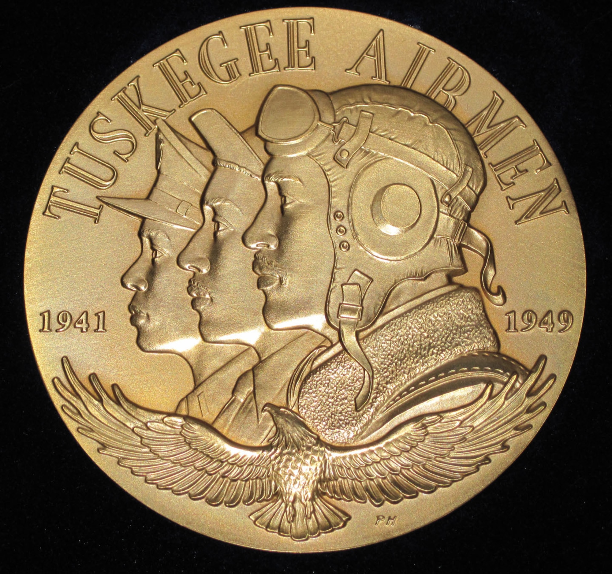 On March 29, 2007, approximately 350 Tuskegee Airmen (or their widows) received the Congressional Gold Medal for their bravery during World War II. The original is at the Smithsonian. This one is one of the bronze replicas given to the individual recipients. (U.S. Air Force photo)