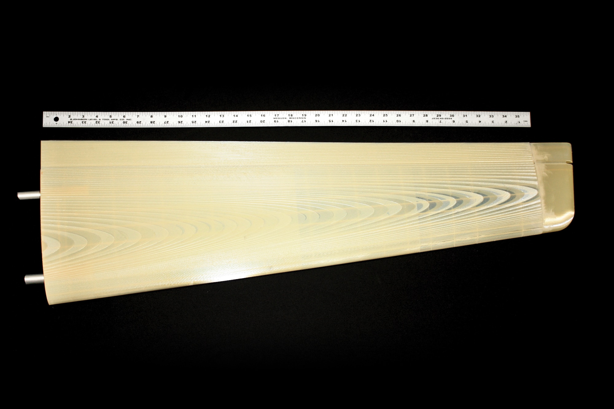 Air Force Research Laboratory's Automated Disposable Airframe Production Technology program proved the utility of fused deposition modeling as a feasible means to manufacture primary structures for unmanned platforms.  Shown is an optimized wing developed with an industrially patented polymer. 
(AFRL image)