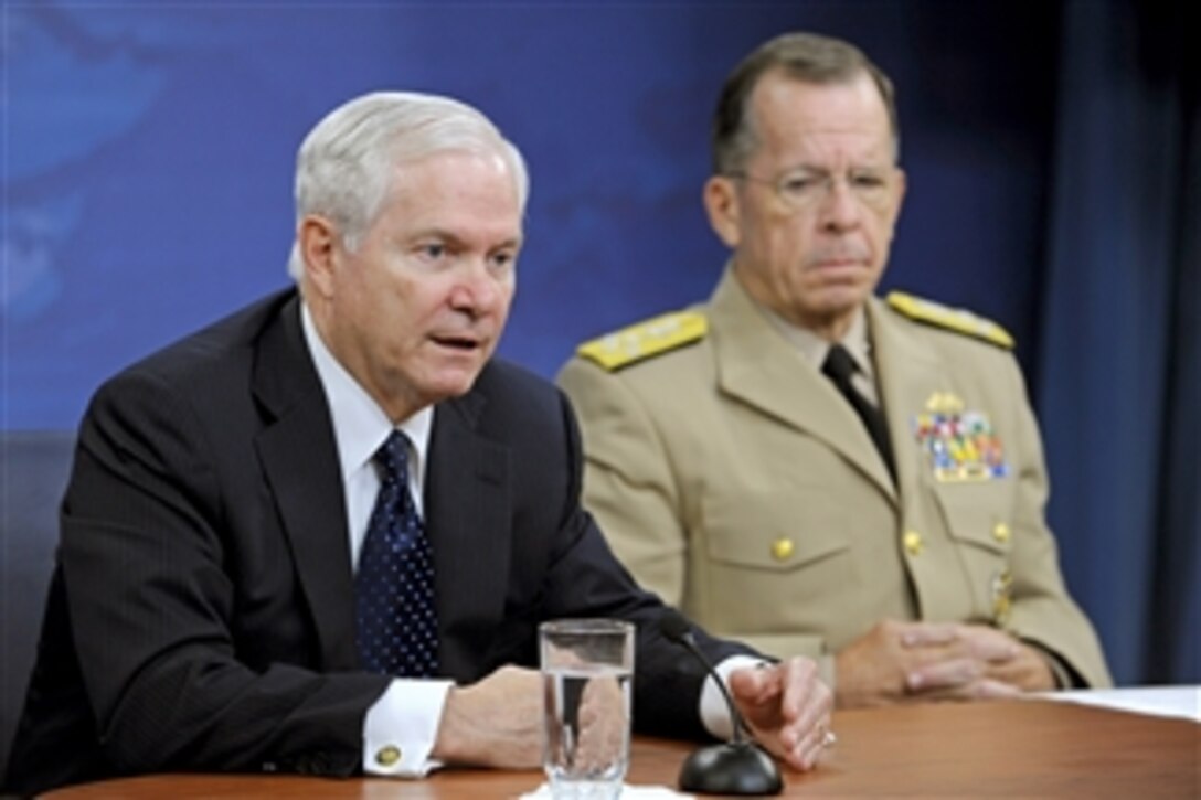 Secretary of Defense Robert M. Gates and Chairman of the Joint Chiefs of Staff Adm. Mike Mullen hold a Pentagon press conference to discuss the resignation of Gen. Stanley A. McChrystal on June 24, 2010.  