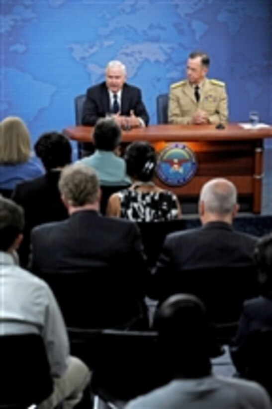 Secretary of Defense Robert M. Gates and Chairman of the Joint Chiefs of Staff Adm. Mike Mullen hold a joint Pentagon press conference to discuss the resignation of Gen. Stanley A. McChrystal on June 24, 2010.  