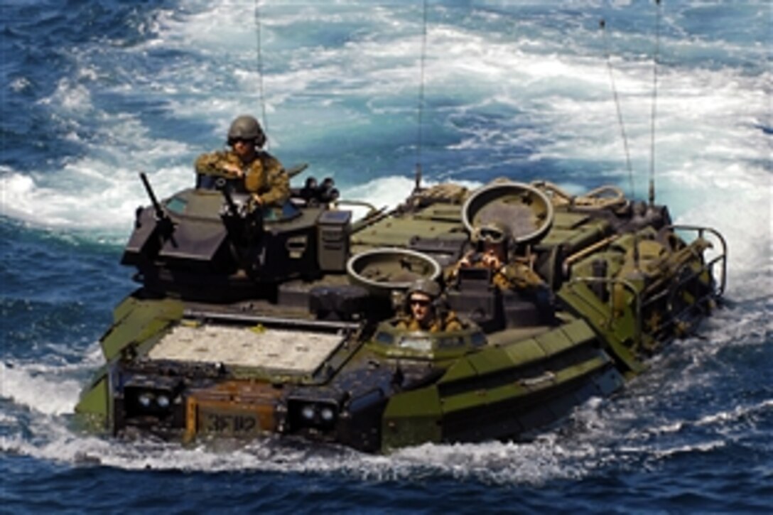 U.S. Marines return to the amphibious transport dock ship USS Dubuque in an amphibious assault vehicle after training with Indonesian marines during Marine Exercise 2010, Indonesia, June 22, 2010. The exercise is designed to provide training to the Indonesian military and build relationships that help maintain regional stability.