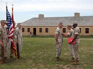 FORT SNELLING, MINN--Col. Matthew J. Bonnot, Commanding Officer 9th Marine Corps District, awards the Meritorious Service Medal to Major Daniel E. Colvin, the outgoing Commanding Officer of Recruiting Station Twin Cities, during a change of command ceremony held on the grounds of Historic Fort Snelling. Under Colvin’s command, the recruiting station received the Commandant’s Superior Achiever Award for the years of 2007, 2008 and 2009. Photo by Staff Sgt. Stephen L. Traynham