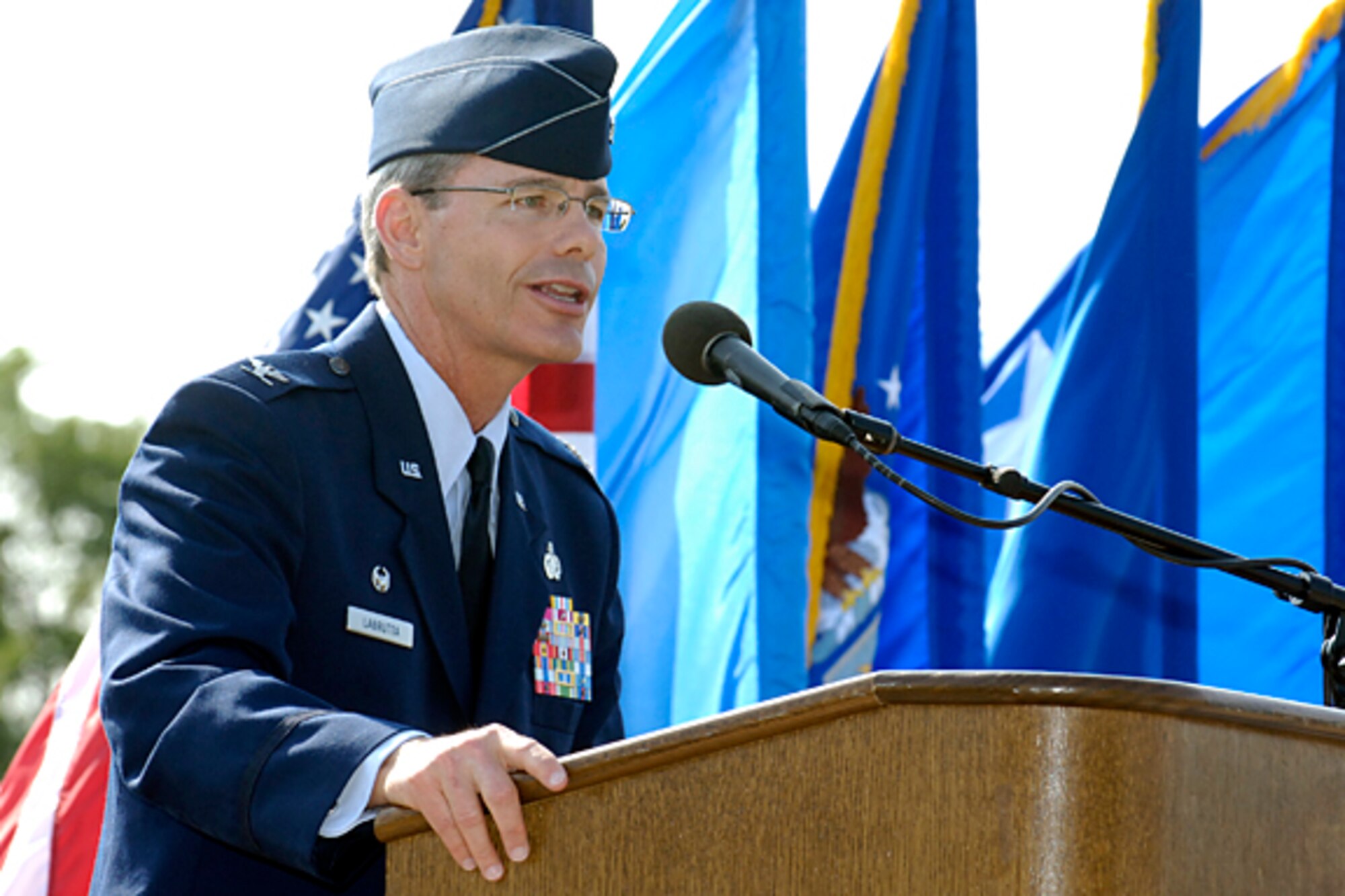 Moments after assuming command of the 72nd Air Base Wing June 25, Col. Bob LaBrutta tells the 72nd Air Base Wing he looks forward to the opportunities ahead. (Air Force photo by Margo Wright)