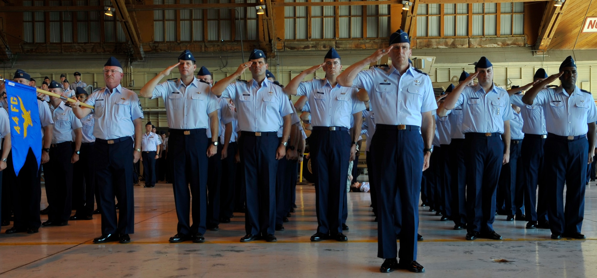 HOLLOMAN AIR FORCE BASE, N.M. -- Members of the 44th Fighter Group welcome the incoming commander with a salute during the 49th Wing Change of Command at hangar 301, June 25, 2010. Colonel Krumm came to Holloman from the Pentagon where he served as Chief of Staff of the Air Force Fellowship Program. (U.S. Air Force photo by Airman 1st Class Joshua Turner / Released)