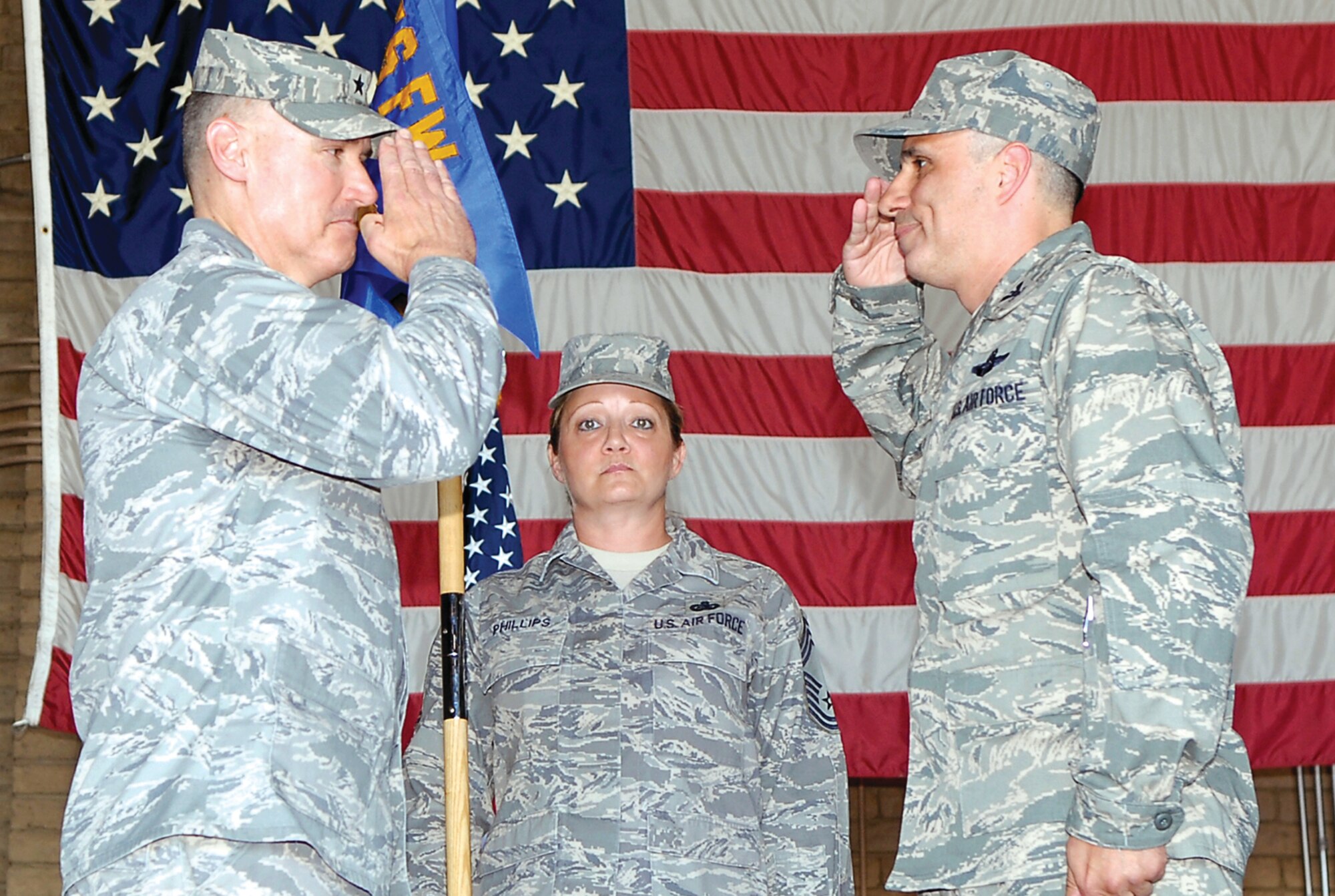 Brig. Gen. Kurt Neubauer, left, 56th Fighter Wing commander, returns the salute of Col. Philippe Darcy, incoming 56th Mission Support Group, June 18 during a change-of-command ceremony at Luke AFB, Ariz. (Photo by A1C Ronifel Yasay)