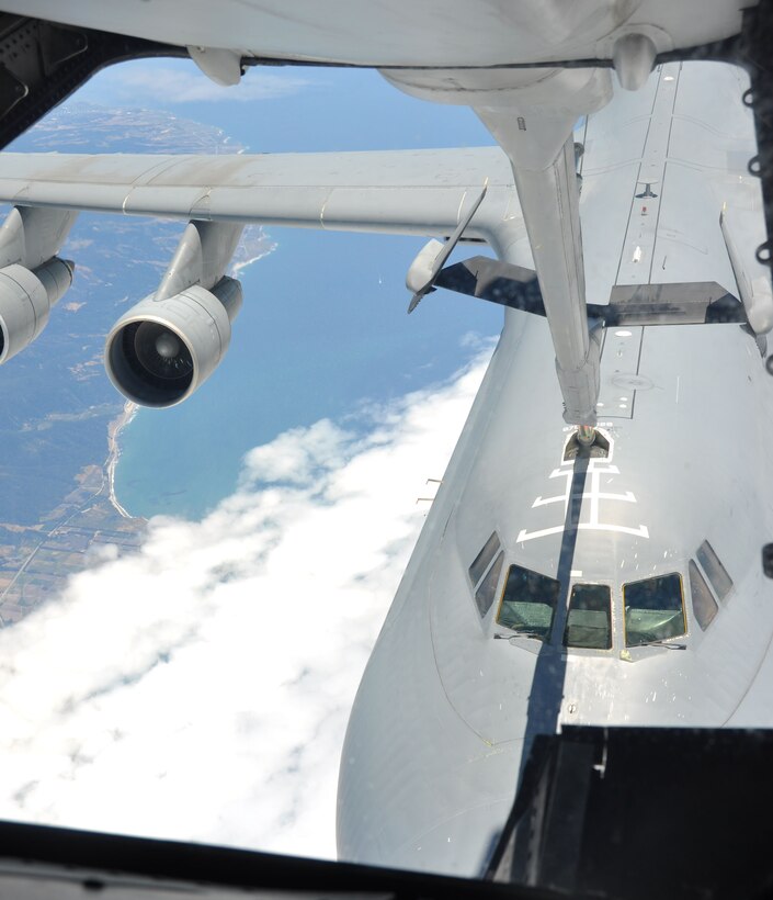 A C-5 Galaxy recieves fuel from a Travis KC-10 Extender during a training mission June 24. (U.S. Air Force photo/Airman 1st Class Michael Battles)