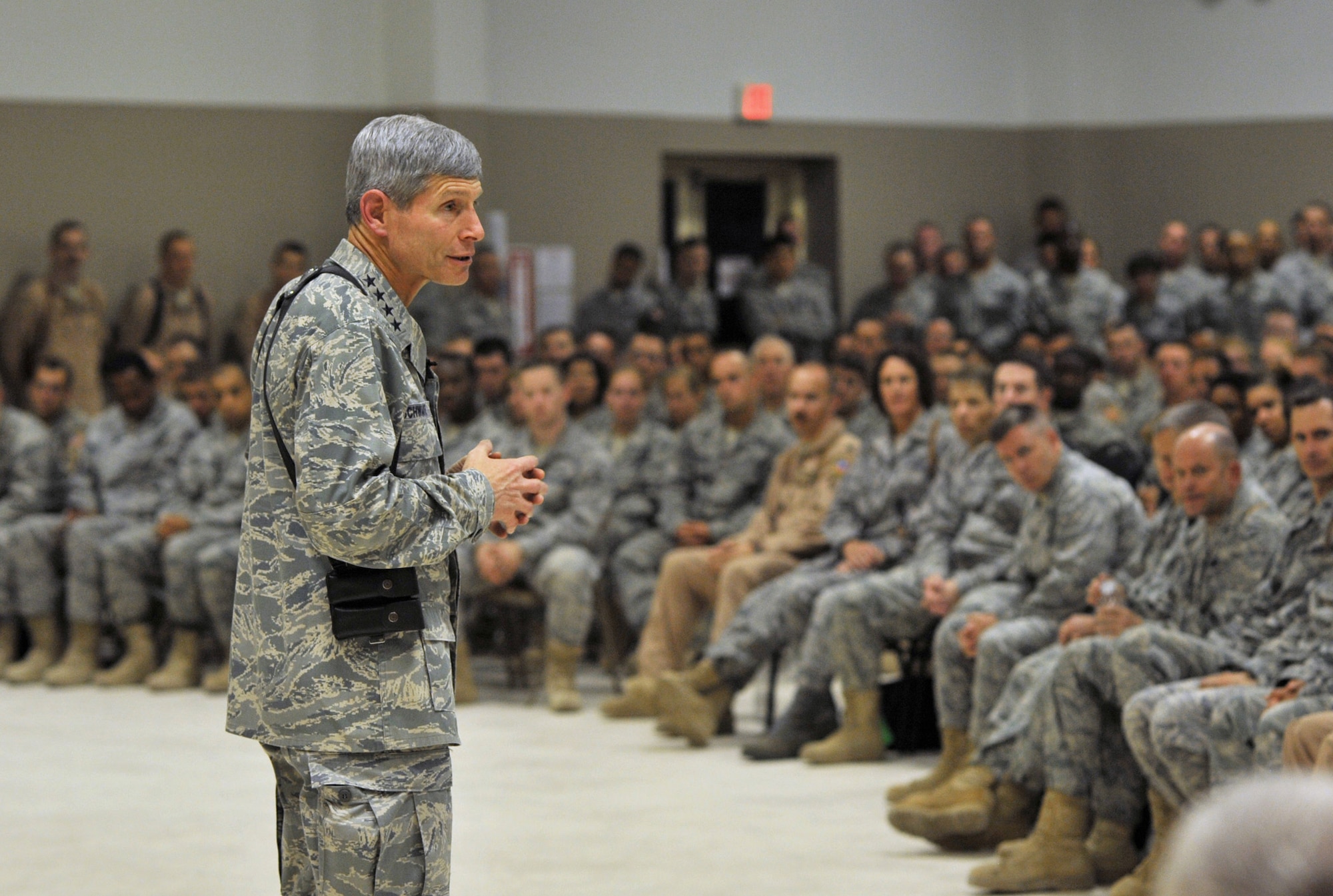 Gen. Norton Schwartz speaks with Airmen from the 332nd Air Expeditionary Wing during a visit June 24, 2010, at Joint Base Balad, Iraq. During the meeting, General Schwartz discussed Air Force priorities and answered questions. (U.S. Air Force photo/Lt. Col. Robert Couse-Baker)