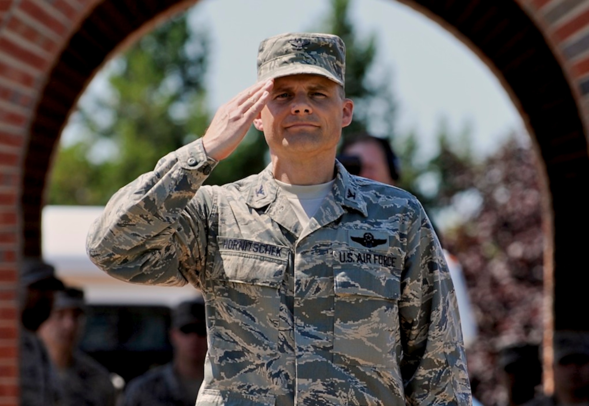 SCOTT AIR FORCE BASE, Ill. -- Col. Michael Hornitschek, 375th Air Mobility Wing commander, receives his first salute from the Airmen of the 375th AMW during a change of command ceremony Friday. Colonel Hornitschek arrives from McChord Air Force Base, Wash., where he served as the vice commander. (U.S. Air Force photo/ Senior Airman Ryan Crane)