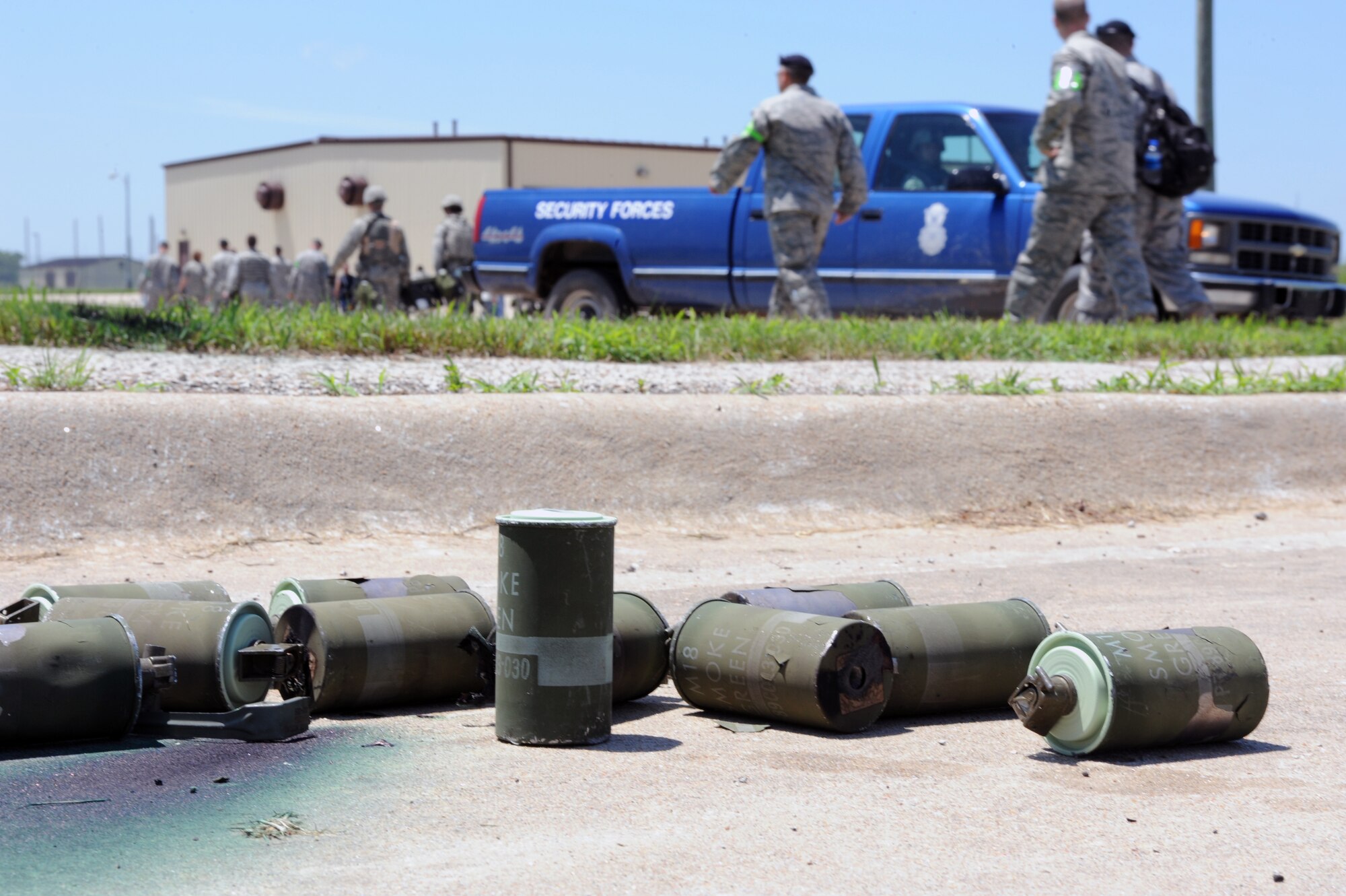 WHITEMAN AIR FORCE BASE, Mo. - Airmen from the 509th Security Forces Squadron complete the force-on-force exercise and gather to discuss the results June 18. The force-on-force exercise placed Airmen in conditions commonly found in combat such as gunfire, explosions, smoke and situations requiring split second decisions. (U.S. Air Force photo by Tech. Sgt. Charles D. Larkin Sr.)