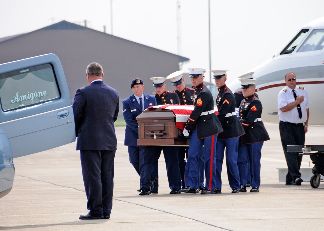 The remains of Lance Cpl. Timothy G. Serwinowski 3rd Battalion, 6th Marine Regiment, 2nd Marine Division, II Marine Expeditionary Force arrive at the Niagara Falls Air Reserve Station, June 25, 2010, Niagara Falls, NY. Family, friends, military personnel and the Patriot Guard Riders were on hand at the base. (U.S. Air Force photo by Staff Sgt. Joseph McKee)