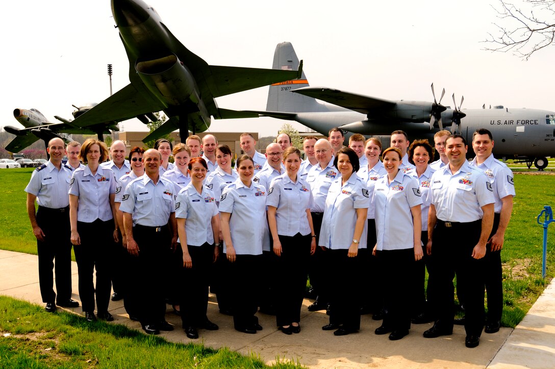 The Concert Band personnel of the 566th Air Force Band - The Air National Guard Band of the Midwest.  This picture was taken by MSgt Scott Thompson at the Air Park of the 182nd AW, Peoria, IL.