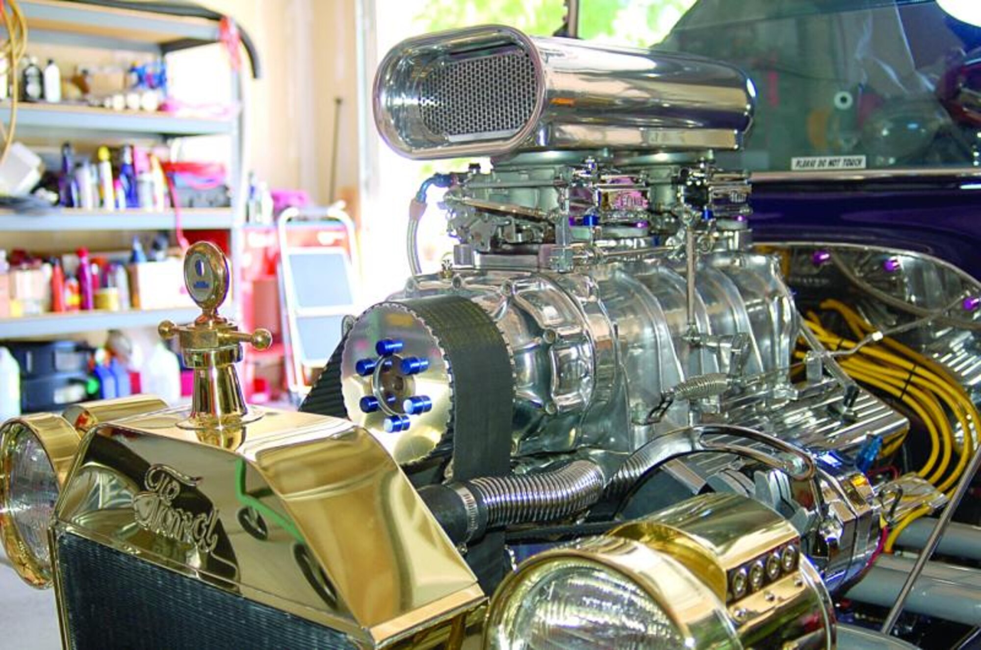 Brass and aluminum parts, coupled with a 671 blower, make up the engine of the 1923 Roadster. (U.S. Air Force photo by: Bill Orndorff)