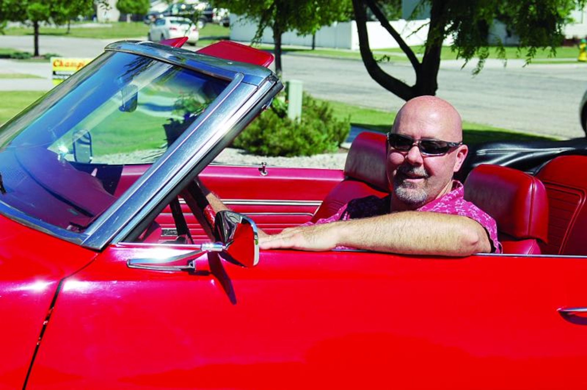 Corey Dalton, 571st Commodities Maintenance Squadron, considers his '69 Rally Sport Camaro to be just like a member of his family. (U.S. Air Force photo by: Bill Orndorff)