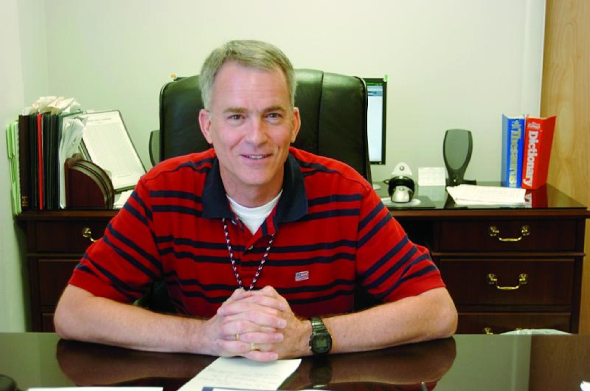 Richard S. Jones, Munitions Accountability System manager, who was selected as the Lt. Gen. Leo Marquez award winner at the Air Force level for Munitions and Missile Maintenance Civilian Manager of the year 2009, works at his desk June 18. He was also recognized at the AFMC level in another category. Five others from Hill Air Force Base will also be honored at that level. (U.S. Air Force photo by: Airman 1st Class Melissa Dearstone)