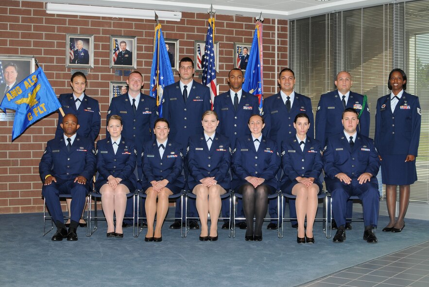 McGHEE TYSON AIR NATIONAL GUARD BASE, Tenn. -- Airman Leadership School Class 10-4, C-Flight, gathers at The I.G. Brown Air National Guard Training and Education Center here, June 7, 2010. Pictured (L-R front row) are Senior Airman Brad Burl; Senior Airman Eve Wasche; Senior Airman Jacqueline Aaron; Staff Sgt. Amber Campbell; Senior Airman Adrianne Williamson; Senior Airman Joyce Avedisian; Senior Airman Sean Wilson; (L-R back row) Senior Airman Aja Cornella; Senior Airman Donald Henry; Senior Airman Anthony Graham; Senior Airman Neal Harris; Senior Airman Prudencio Aguon; Senior Airman Jauies Sosa; and Tech. Sgt. Janice Ladd, instructor. (U.S. Air Force photo by Master Sgt. Kurt Skoglund/Released)