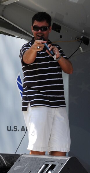 SEYMOUR JOHNSON AIR FORCE BASE, N.C. -- Richard Phillips performs during a Family Appreciation Day festival here June 19, 2010. The festival was hosted by Whitley Church, The Bridge and the 4th Fighter Wing Chapel. The church scheduled several contemporary Christian artists to perform through the event. (U.S. Air Force photo/Senior Airman Gino Reyes) 
