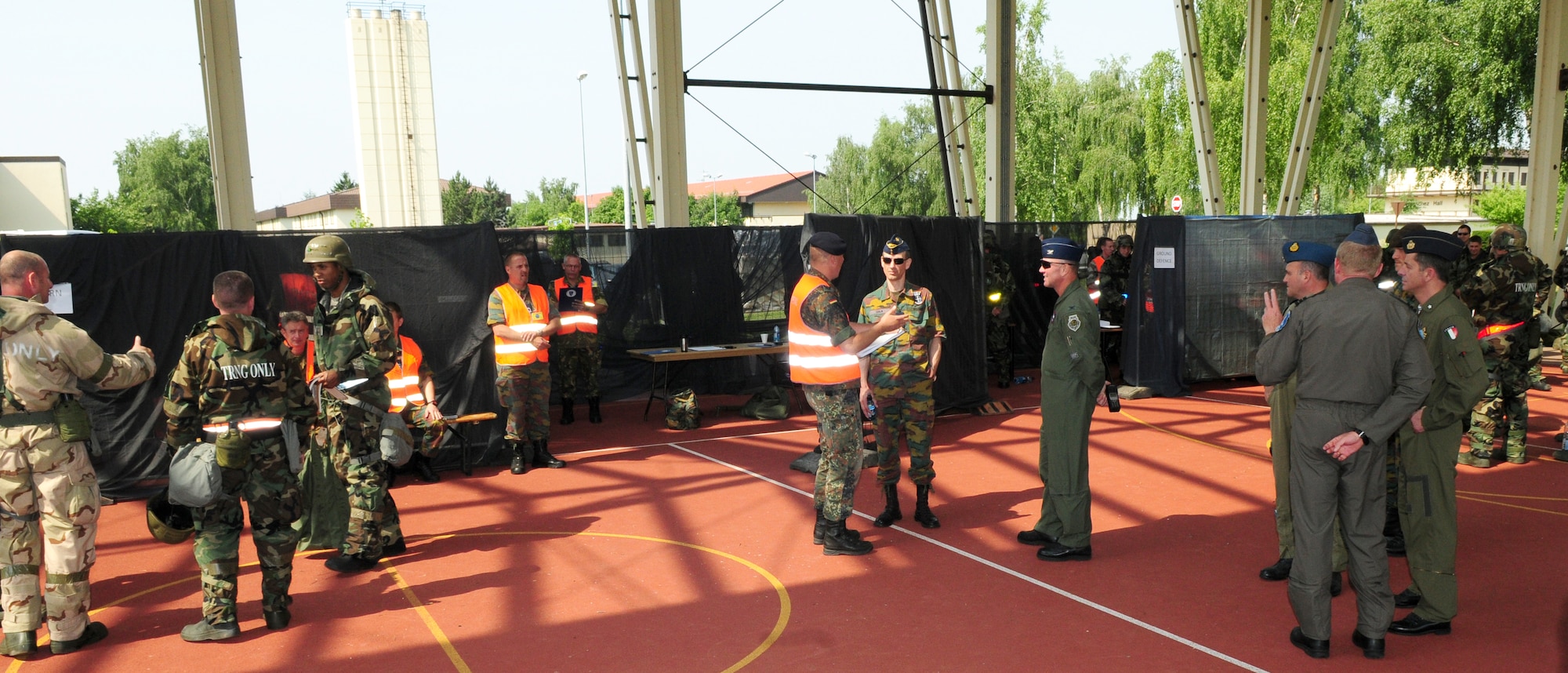 SPANGDAHLEM AIR BASE, Germany -- Inspectors evaluated a random selection of Sabers on individual core competency skills such as ground defense, post attack reconnaissance sweeps, fire training and self-aid and buddy care through practical application and understanding,  as well as written evaluations while installation leadership and distinguished visitors from various NATO countries observed here June 25. The ICCS assessments are one portion of the NATO force evaluation Spangdahlem has participated in this week. Representatives of the NATO countries want to gain insight to aid in upcoming inspections and daily processes. (U.S. Air Force photo/Staff Sgt. Heather M. Norris)