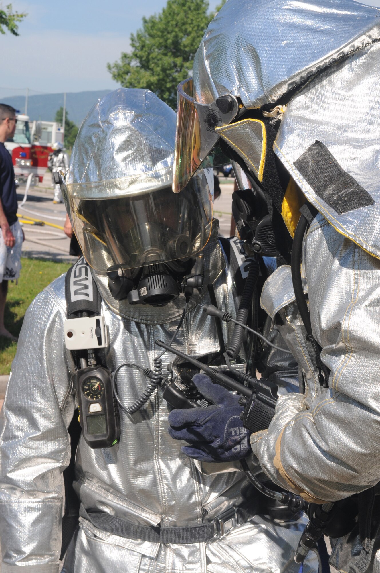 Firefighters assigned to the 31st Civil Engineer Squadron construct a plan while responding to a major accident response exercise April 23. First responders were evaluated on their performance, such as assessing the scene for hazardous material, providing self aid and buddy care to victims, and protecting the scene. (U.S. Air Force photo/Staff Sgt. Nadine Y. Barclay) 