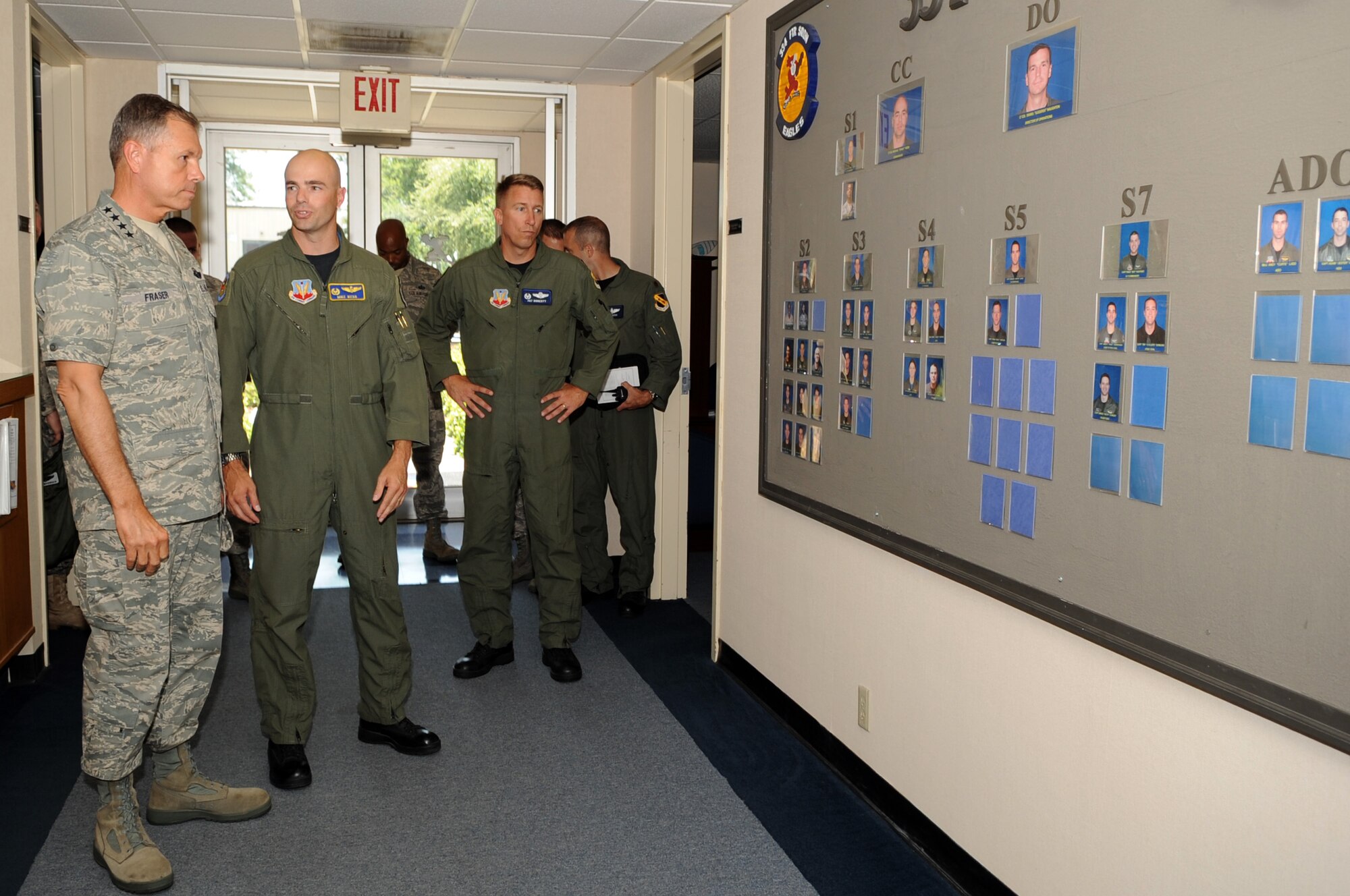 SEYMOUR JOHNSON AIR FORCE BASE, N.C. – Gen. William M. Fraser III takes a look at manning and receives a briefing from Lt. Col. Mike Webb the F-15E Strike Eagle fighter community here June 17, 2010. As the commander of Air Combat Command, General Fraser is responsible for organizing, training, equipping and maintaining combat-ready forces for rapid deployment and employment with ensuring strategic air defense forces are ready to meet the challenges of peacetime air sovereignty and wartime defense. (U.S. Air Force photo/Staff Sgt. Courtney Richardson)