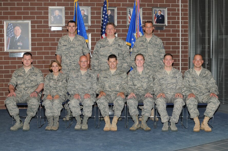 McGHEE TYSON AIR NATIONAL GUARD BASE, Tenn. -- Satellite NCO Academy Class 10-6, Joint Force Headquarters, Massachusetts Air National Guard, gathers at The I.G. Brown Air National Guard Training and Education Center here, June 15, 2010.  Pictured (L-R standing) are Tech. Sgt. Keith Fournier; Tech. Sgt. Keith Vaillancourt; Tech. Sgt. John Gallinagh; (L-R sitting) Tech. Sgt. Brian Fournier;  Tech. Sgt. Sara Norman; Tech. Sgt. Douglas Gilson; Tech. Sgt. Jared Fournier; Tech. Sgt. Cynthia Thomas; Tech. Sgt. Paul Levesque; and Tech. Sgt. Todd James.  (U.S. Air Force photo by Master Sgt. Kurt Skoglund/Released)