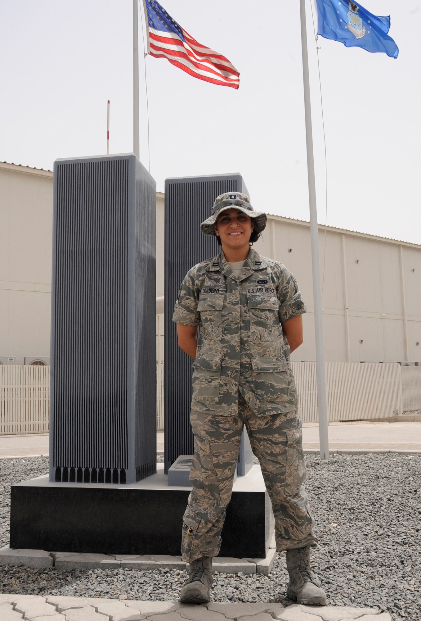 Capt. Jaclyn Cordero is a maintenance officer with the 380th Expeditionary Maintenance Squadron at a non-disclosed base in Southwest Asia. She is pictured her ein front of the base?s September 11th memorial. She is deployed from the 6th Maintenance Operations Squadron at MacDill Air Force Base, Fla., and her hometown is Staten Island, N.Y. 