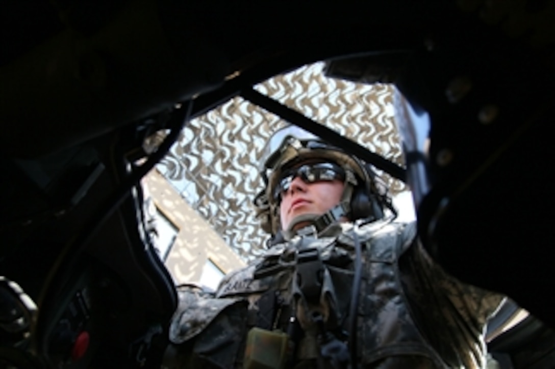 U.S. Army Pfc. Timothy Glantz of Alpha Company, 426th Brigade Support Battalion provides security in the turret of a mine-resistant, ambush-protected vehicle along route California in Kunar province, Afghanistan, during a resupply mission from Jalalabad Air Field to Combat Outpost Bostic on June 20, 2010.  