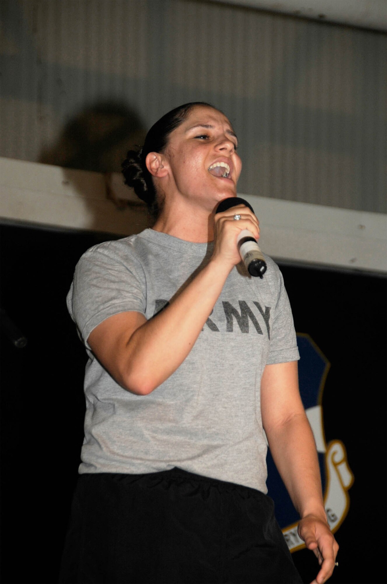 Sergeant Marsha Milliken; HHB 1-7 ADA battle noncommissioned officer; competes in the 380th Air Expeditionary Wing's version of American Idol; held at the pavillion June 25.(U.S. Air Force photo/Capt. Jessica Martin)