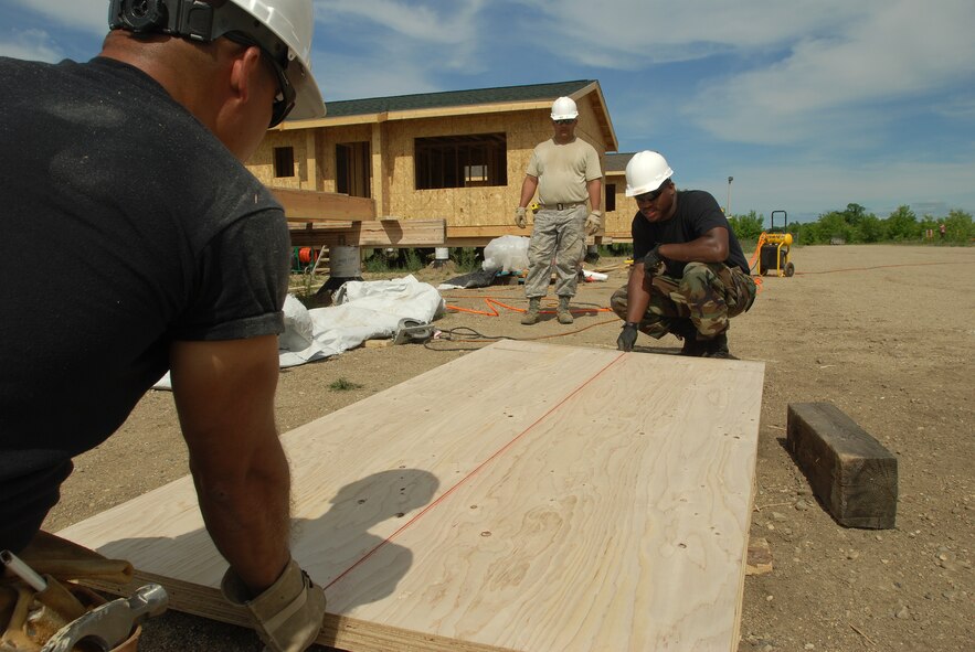 Members of the 433rd Civil Engineering Squadron conduct a humanitarian mission in the Red Lake Indian Reservation for the Red Lake band of Chippewa Indians, just outside of Bemidji, Minnesota. (U.S. Air Force photo/Airman 1st Class Brian McGloin)