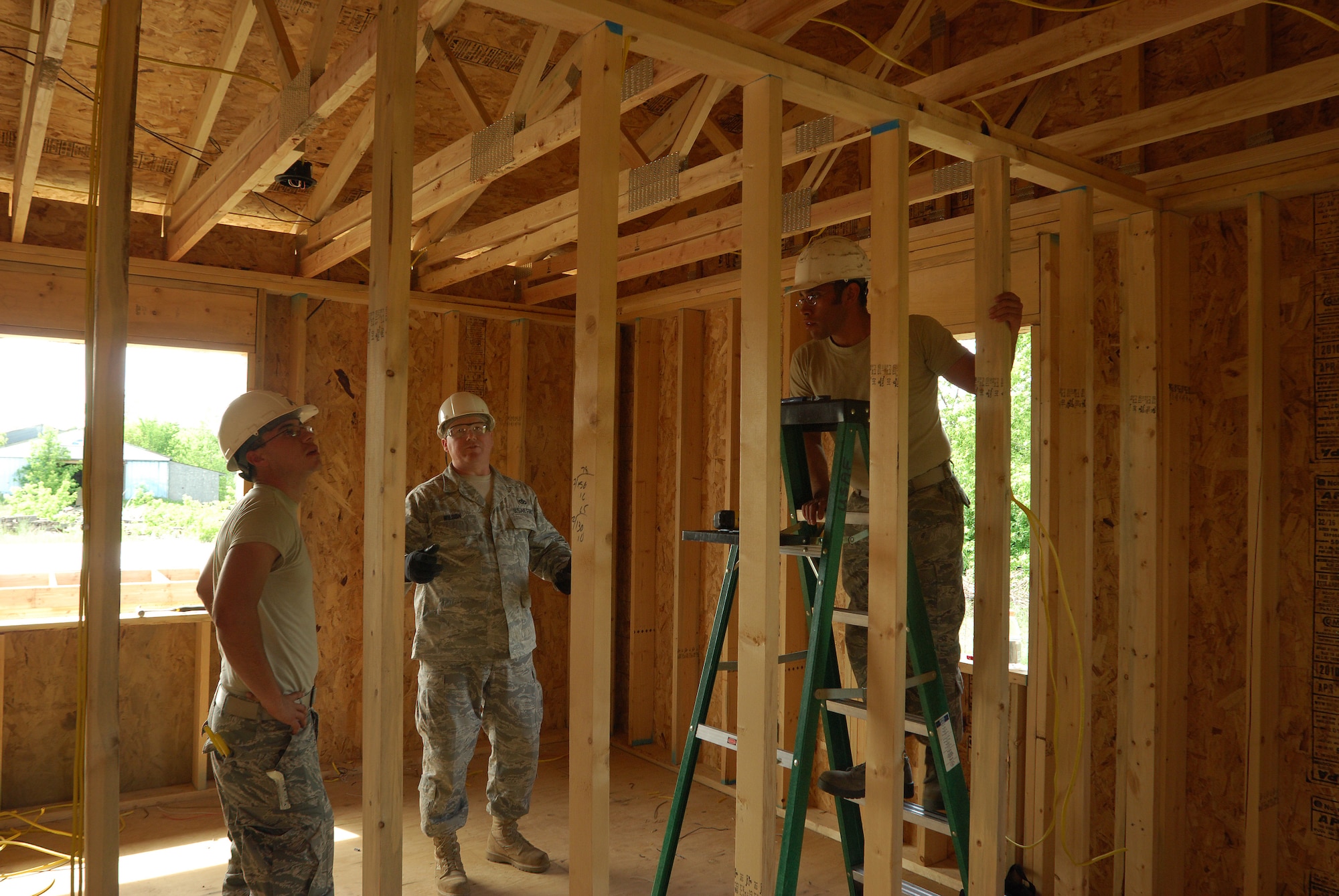 Members of the 433rd Civil Engineering Squadron conduct a humanitarian mission in the Red Lake Indian Reservation for the Red Lake band of Chippewa Indians, just outside of Bemidji, Minnesota. (U.S. Air Force photo/Airman 1st Class Brian McGloin)