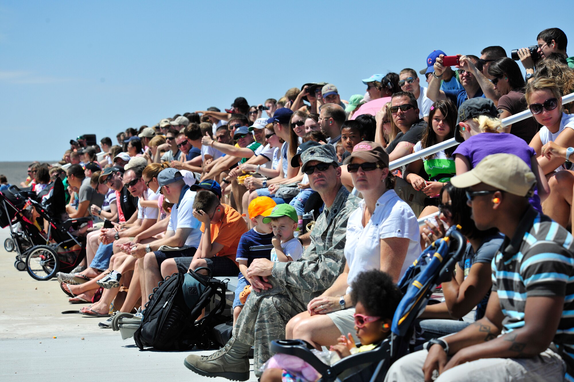 A large crowd gathers to await the start of a Capabilities Exercise, Jun 26, 2010. The CAPEX was held at Melrose Air Force Range and conducted by numerous personnel for the purpose of educating base employees and their families about the mission and capabilities of Cannon Air Force Base. Among the sights were aircraft and ground demonstrations. (US Air Force Photo by Tech. Sgt. Josef Cole)