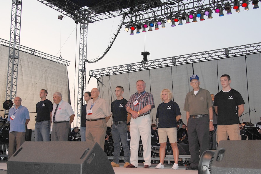 Korean War veterans and Airmen readying to depart for Air Force basic military training were honored during Air Force Materiel Command's sixth annual Freedom's Call Tattoo June 25, 2010, at Wright-Patterson Air Force Base, Ohio. The free event attracted about 75,000 people for an evening of music, military ceremonies, aircraft flyovers and fireworks. (U.S. Air Force photo/Ben Strasser) 