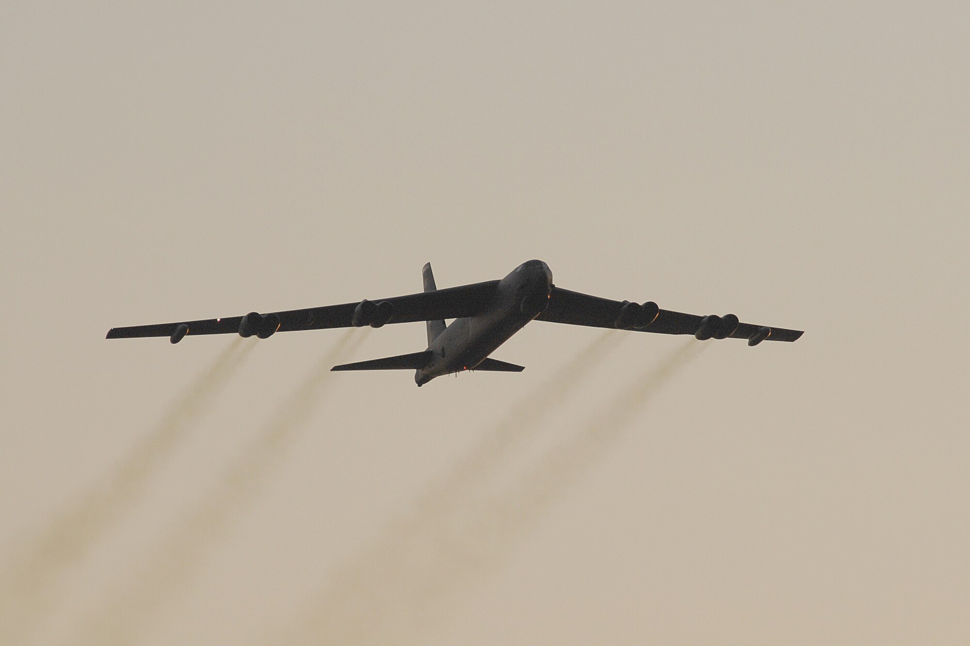 A B-52 Stratofortress performs a flyover of the National Museum of the U.S. Air Force June 25, 2010 during Air Force Materiel Command's sixth annual Tattoo.  The free event attracted more than 75,000 people to Wright-Patterson Air Force Base, Ohio for an evening of music, military ceremony, aircraft flyovers and fireworks. (U.S. Air Force photo/Ben Strasser)