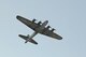 A World War II B-17 Flying Fortress flys over the National Museum of the U.S. Air Force June 25, 2010 during Air Force Materiel Command's sixth annual Tattoo.  The free event attracted more than 75,000 people to Wright-Patterson Air Force Base, Ohio for an evening of music, military ceremony, aircraft flyovers and fireworks. (U.S. Air Force photo/Ben Strasser)