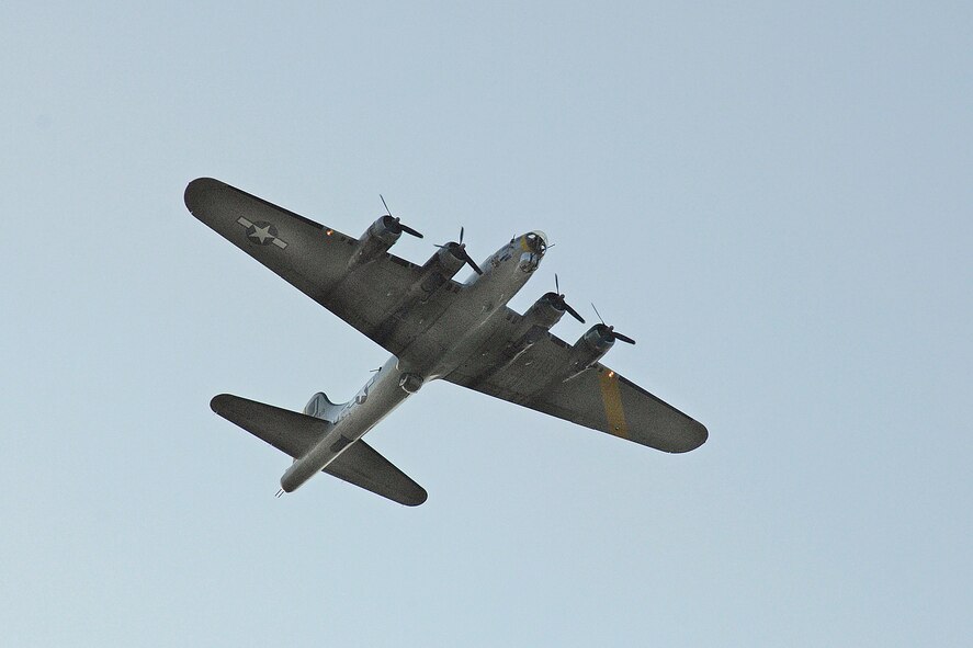 A B-17 Flying Fortress flys over the grounds of the National Museum of the U.S. Air Force June 25, 2010, during Air Force Materiel Command's sixth annual Freedom's Call Tattoo. The free event attracted about 75,000 people to Wright-Patterson Air Force Base, Ohio. (U.S. Air Force photo/Ben Strasser) 