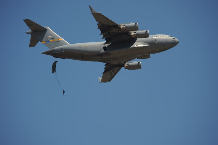 A U.S. Army paratrooper parachutes from a C-17 Globemaster III cargo aircraft from Joint Base Charleston, S.C., during a joint forcible entry exercise June 21, 2010. The 82nd Airborne Division, Fort Bragg, N.C., uses JFEX to train for real-world contingency operations. (U.S. Air Force photo/Staff Sgt.Tim Chacon)