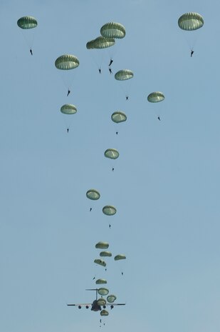 U.S. Army paratroopers from the 82nd Airborne Division, Fort Bragg, N.C., jump from a C-17 Globemaster III cargo aircraft during a joint forcible entry exercise June 21, 2010. The purpose of the JFEX is to re-establish forcible entry capability through air power by combining Army and Air Force training needs. (DoD photo/Tech. Sgt. Tony Tolley/U.S. Air Force)