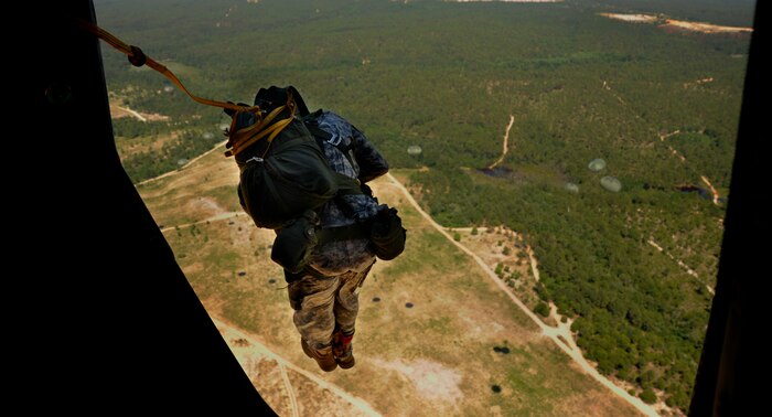 A U.S. Army paratrooper from the 330th Transportation Brigade, Fort Bragg, N.C., performs an airborne insertion from a C-17 Globemaster III cargo aircraft based at Joint Base Charleston, S.C., during a joint forcible entry exercise June 21, 2010. The JFEX  is designed to enhance cohesion between the Army and Air Force through large-scale heavy equipment and troop movements. (U.S. Air Force photo/Staff Sgt. Angelita M. Lawrence)