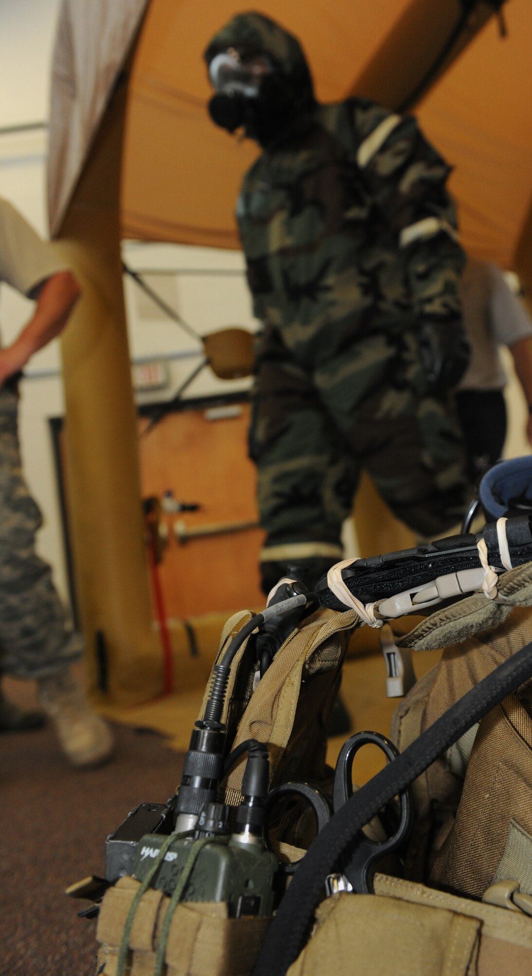 MOODY AIR FORCE BASE, Ga. -- Equipment removed from an aircrew member sits on the ground at the first stage during a training exercise here June 16. Several individuals volunteered to play aircrew members to provide participants a more realistic training experience. (U.S. Air Force photo by Airman 1st Class Benjamin Wiseman/RELEASED)