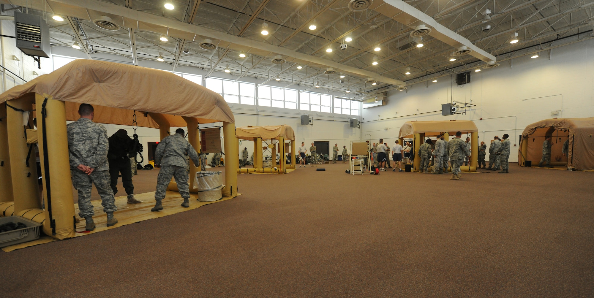 MOODY AIR FORCE BASE, Ga. -- The Lightweight Inflatable Decontamination system is used during a training exercise here June 16. Members from different bases in Air Combat Command came to Moody to work together to standardize the process of contamination mitigation. (U.S. Air Force photo by Airman 1st Class Benjamin Wiseman/RELEASED)