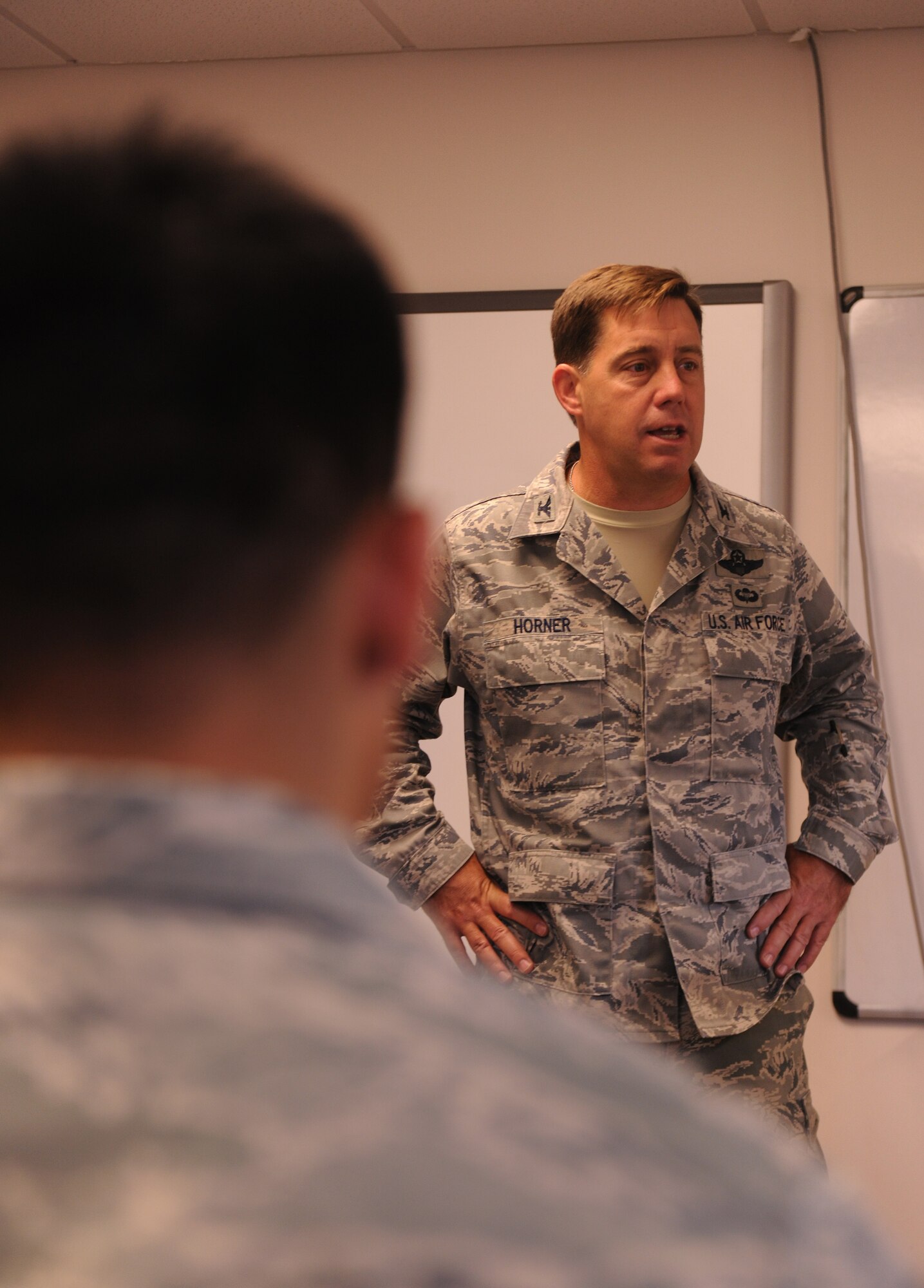 MOODY AIR FORCE BASE, Ga. -- Col. John Horner, 93rd Air Ground Operations Wing commander, asks the attendees questions about Airman Resiliency Training here June 25. The program is designed to help Airmen, family members and civilians recover and grow following an adverse or traumatic event. (U.S. Air Force photo by Airman 1st Class Benjamin Wiseman/RELEASED)