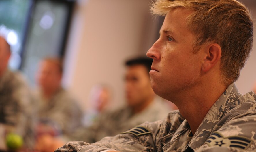 MOODY AIR FORCE BASE, Ga. -- Senior Airman Charles Killebrew, 823rd Security Force Squadron fire team leader, listens as instructors discuss the lesson plan during Airman Resiliency Training held here June 25. This resiliency class was an interactive class where members work though different scenarios while asking questions to the instructors. (U.S. Air Force photo by Airman 1st Class Benjamin Wiseman/RELEASED)