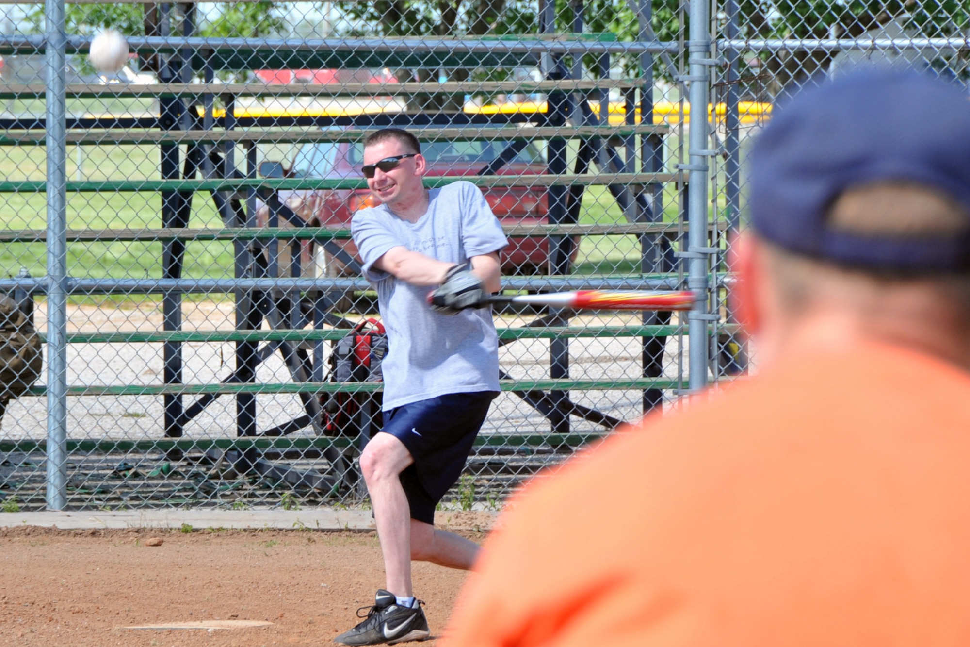 OFFUTT AIR FORCE BASE, Neb. - Aaron Diaz, with the 2d Systems Operations Squadron softball team, gets a base hit June 24 as he practices with the rest of his team at the softball fields on base.  The 2010 intramural softball season began June 28 with 20 teams all vying for the title of base champion. U.S. Air Force photo by Jeff W. Gates.