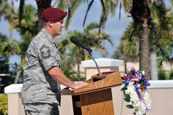 PATRICK AIR FORCE BASE, Fla. - Senior Master Sgt. Mike Ziegler, a reserve pararescueman here, remembers those who perished during the 1996 bombing of the Khobar Towers. Sgt. Ziegler was a first responder on scene after the tragedy that took the lives of five Airmen from Patrick Air Force Base. Family, friends and Airmen gathered to remember the 14th anniversary of that day. (U.S. Air Force photo/John Connell)