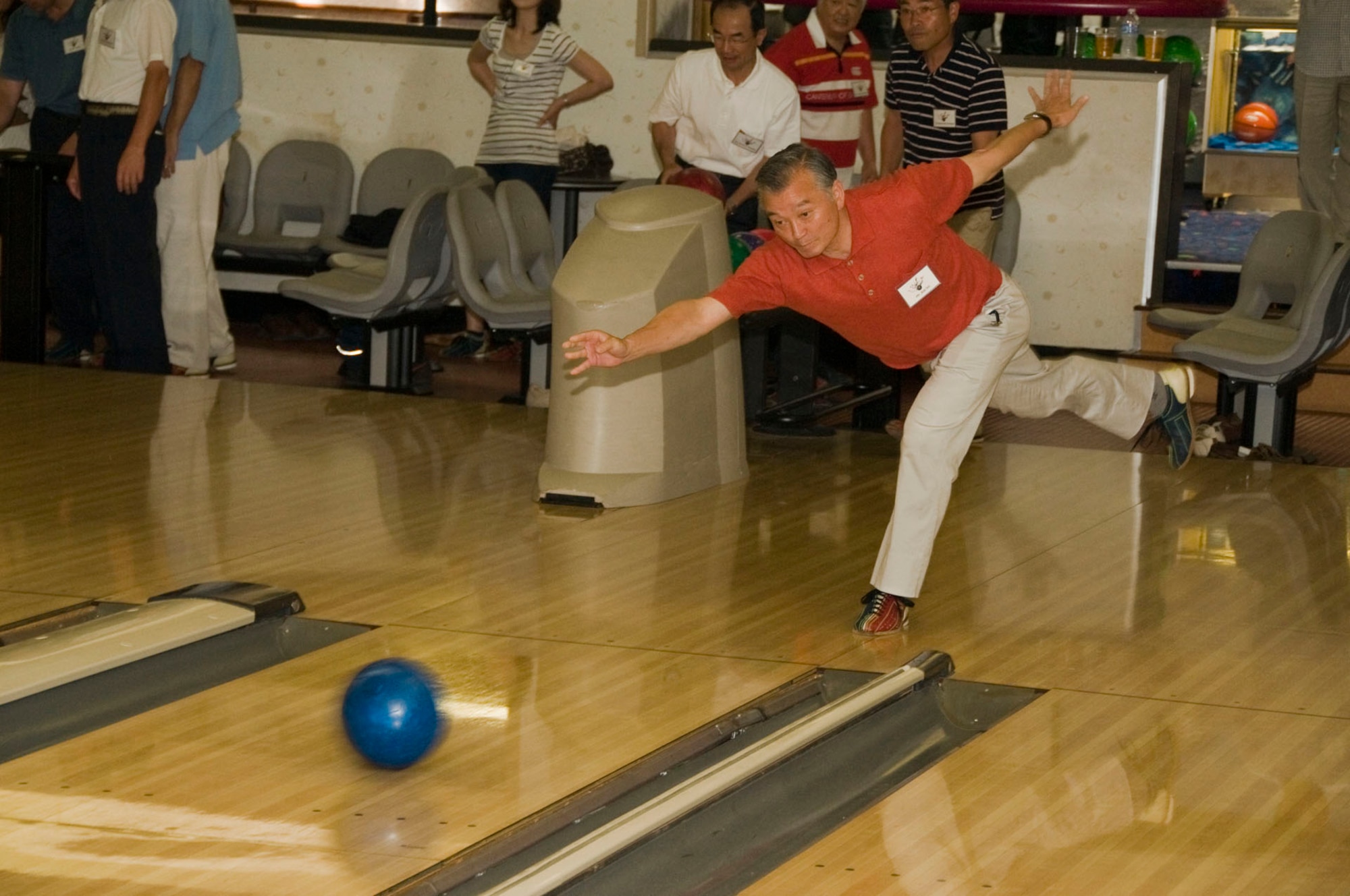 Koji Ito, Director of Administration, Misawa City Office of Auditing, bowls during a friendship bowling tournament between the 35th Fighter Wing community, JASDF leadership and Misawa City officials at the Walmsley Bowling Center June 26. Mr. Ito helped his team capture first place with a combined score of 613 points. (U.S. Air Force photo/Senior Airman Jessica Lockoski)