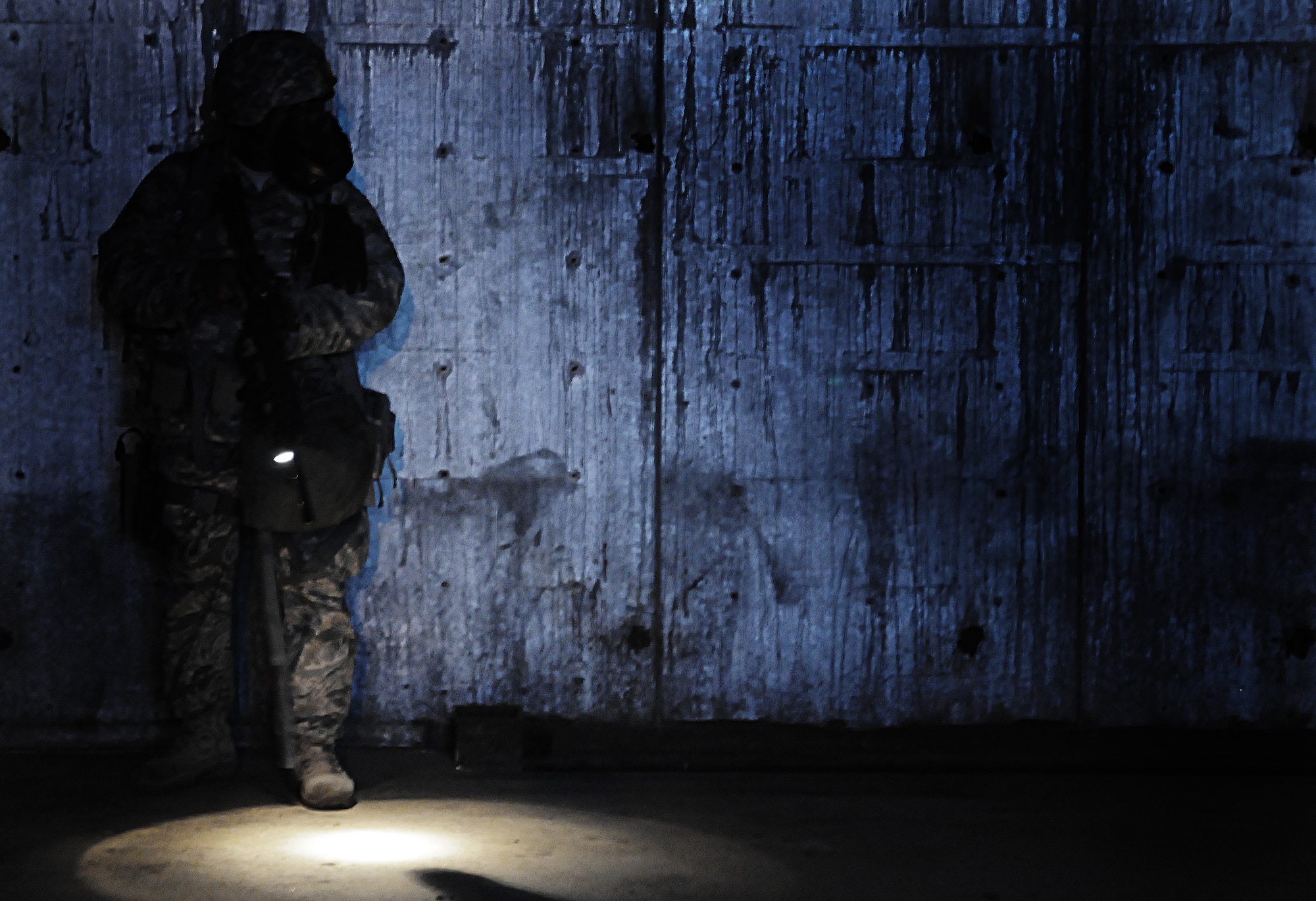 Airmen from the 39th Security Forces Squadron clear an area during an early morning exercise Thursday, June 24, 2010 at Incirlik Air Base, Turkey. Exercises are held often throughout the Air Force to keep Airmen trained and ready for real-world situations. (Air Force photo/ Senior Airman Alexandre Montes)