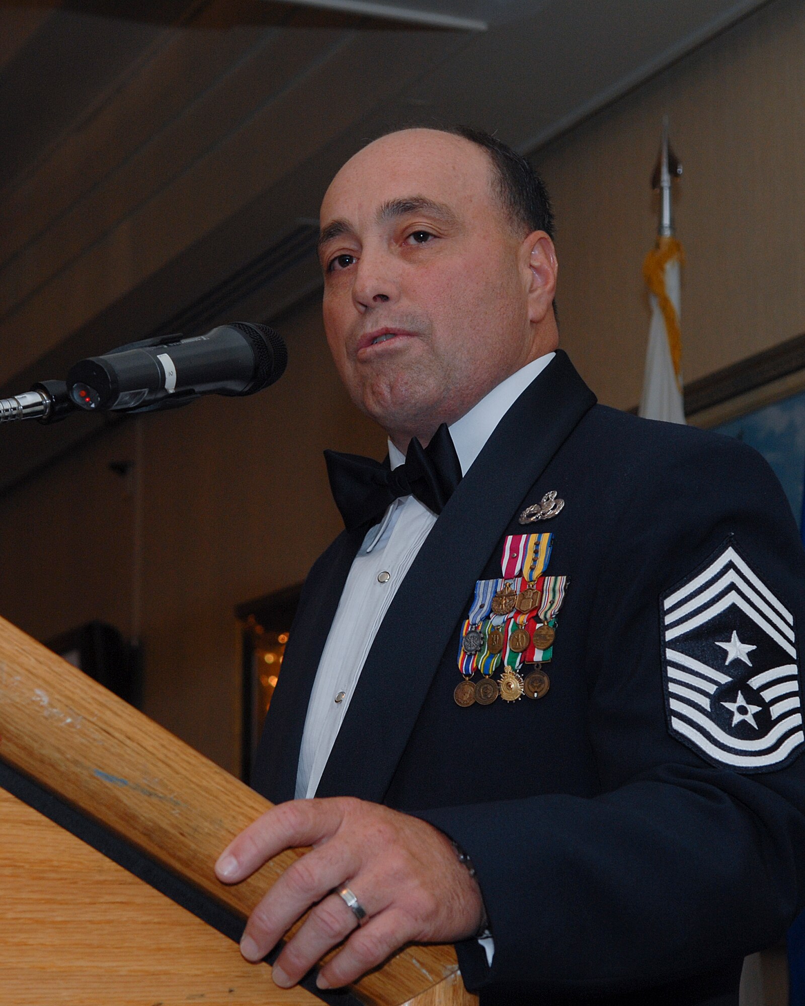KUNSAN AIR BASE, Republic of Korea -- Chief Master Sgt. James Sanders, 8th Fighter Wing command chief, says a few words as a guest speaker during a Senior Non-commissioned Officer Promotion Recognition banquet June 26. The purpose of the banquet was to celebrate and recognize the 33 new master sergeant selects of the Wolf Pack. (U.S. Air Force photo/Senior Airman Roy Lynch)