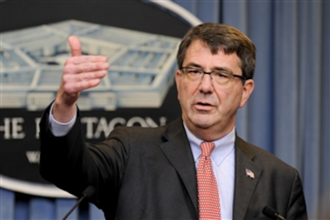 Under Secretary of Defense for Acquisition, Technology and Logistics Ashton Carter briefs reporters in the Pentagon on new acquisition initiatives designed to provide incentives to Department of Defense contractors to cut the costs of their programs on June 28, 2010.  