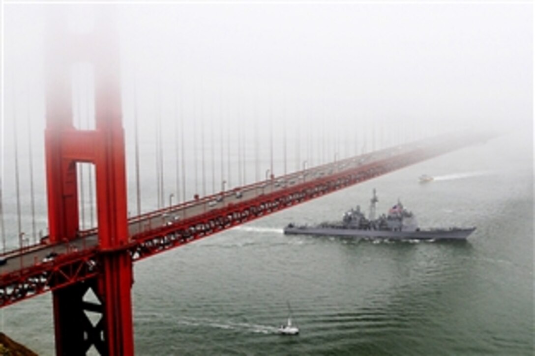 The USS Bunker Hill passes under the Golden Gate Bridge to conduct exercises with the Russian Federation Navy missile cruiser Varyag in the San Francisco Bay, Calif., June 25, 2010.